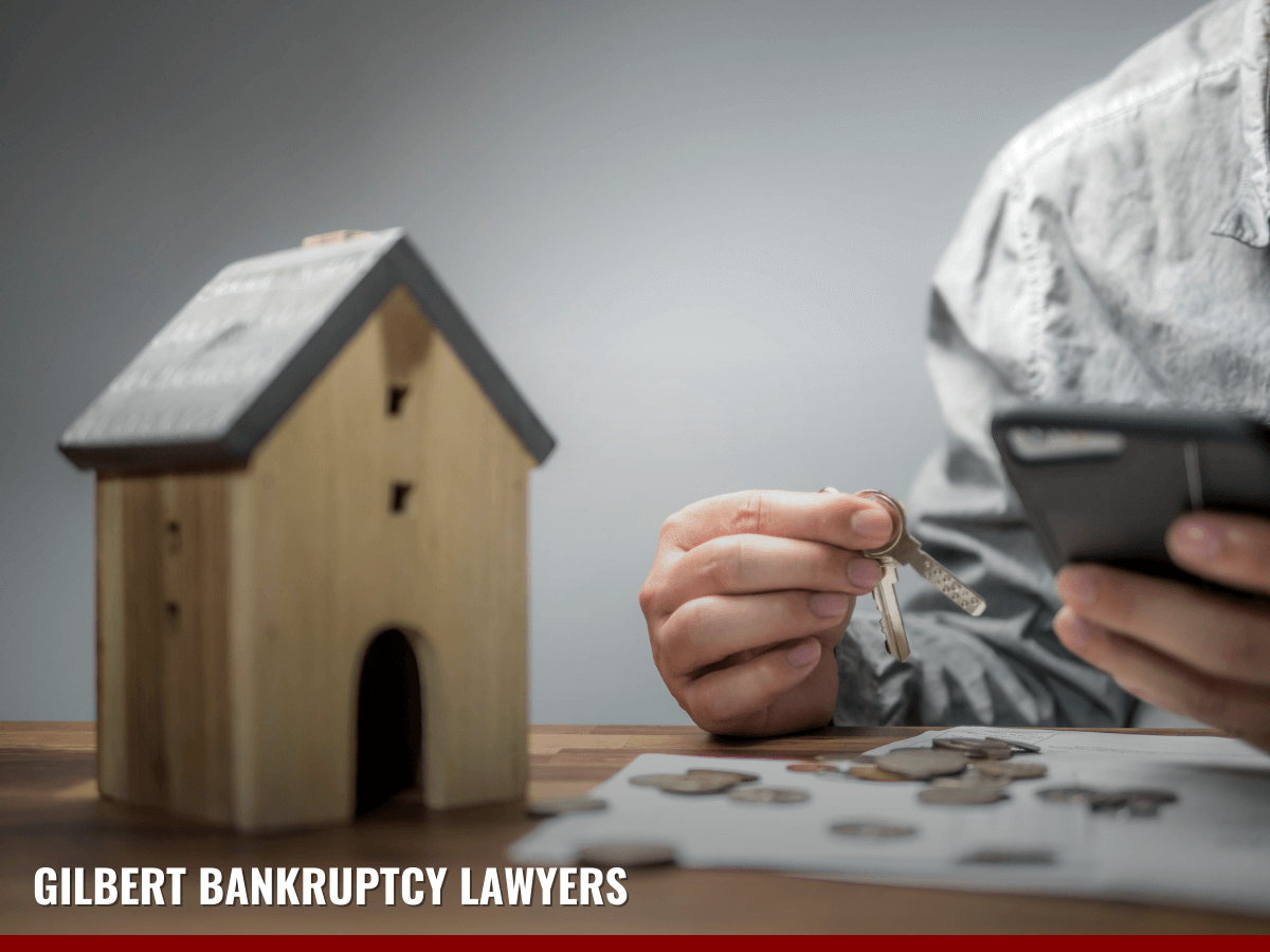 Man with financial problems checking bills and trying to find if his property will be exempt from his bankruptcy