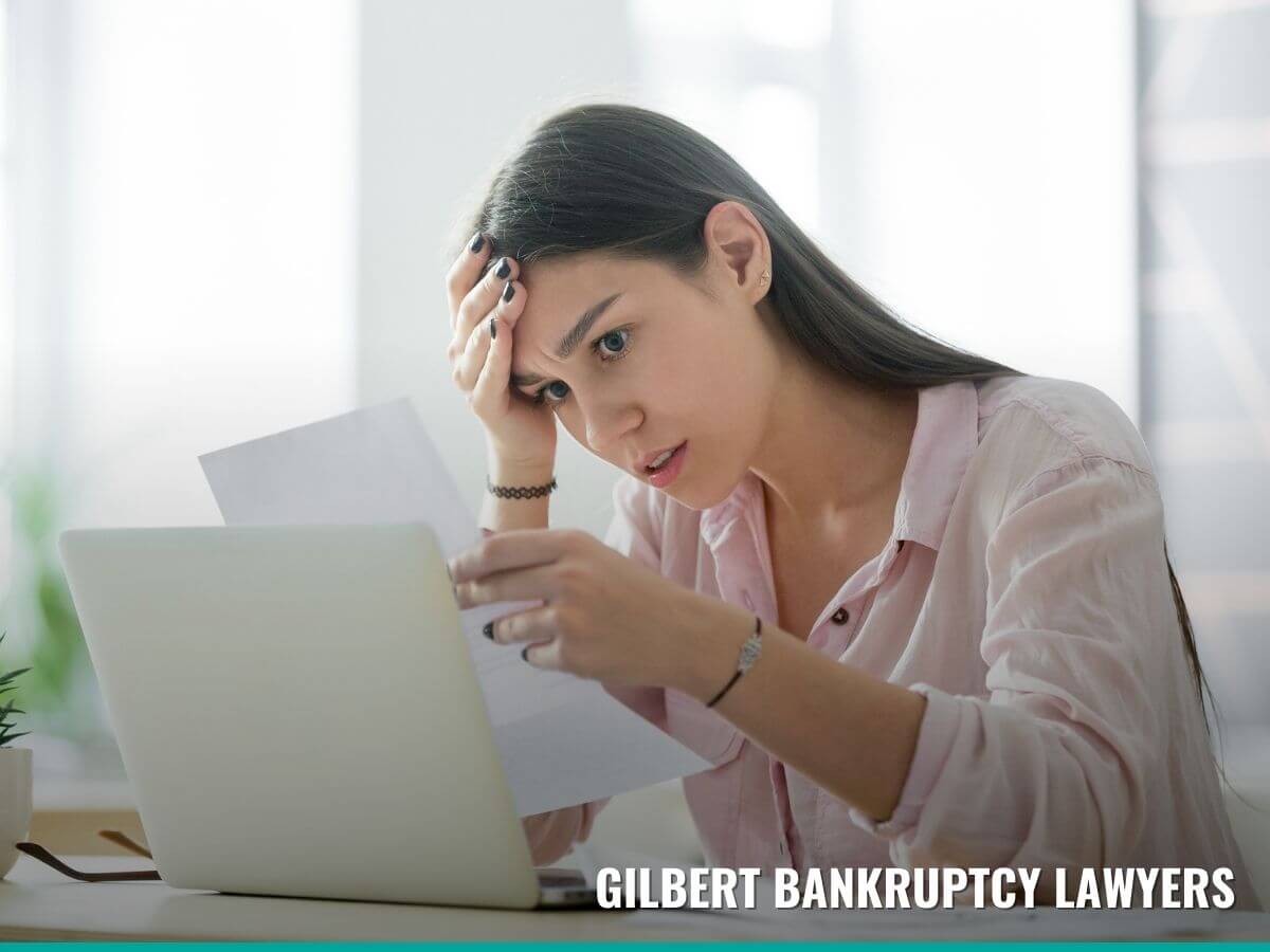 Woman reviewing different bankruptcy alternatives