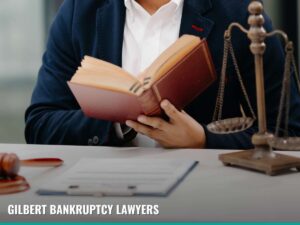 Gilbert bankruptcy lawyer reviewing legal documents related to Chapter 11 Bankruptcy cases