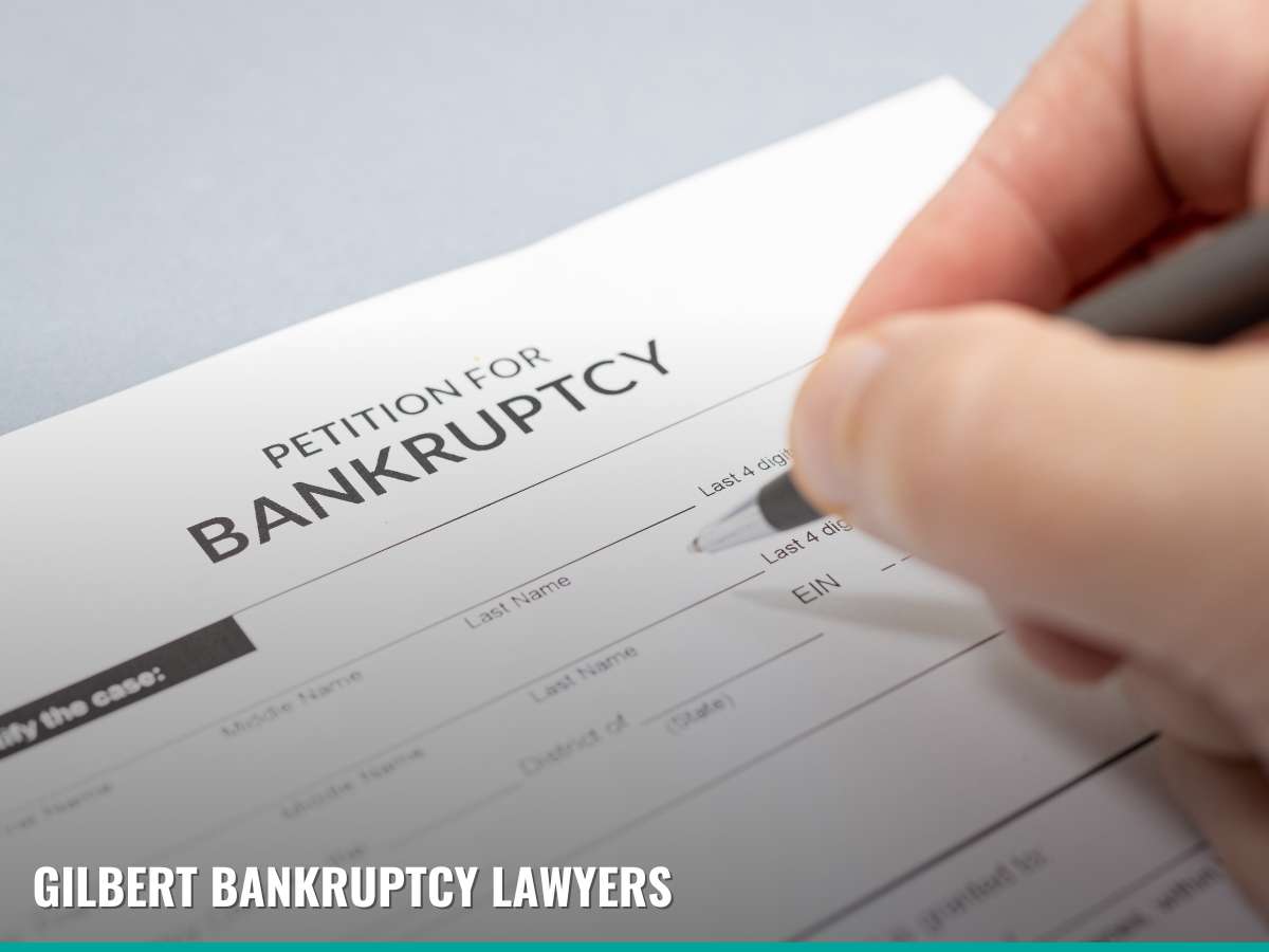 Filing For Bankruptcy In Gilbert form being completed by hand